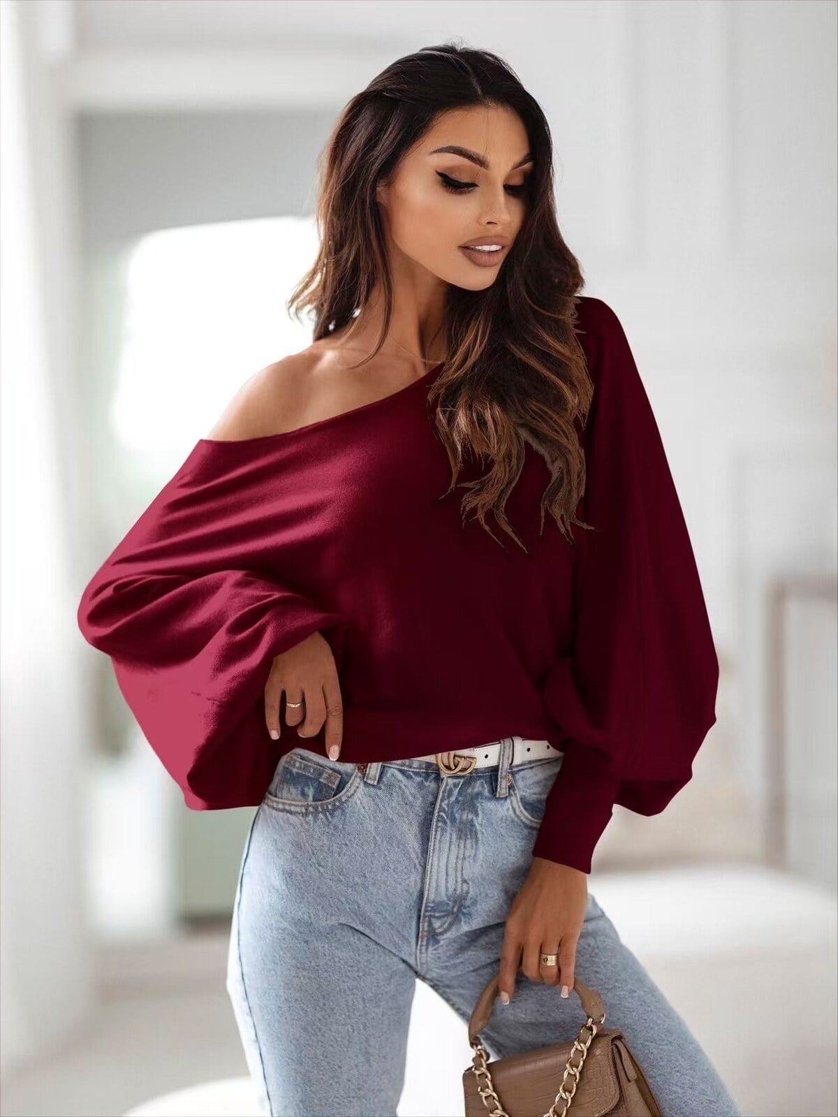Off shoulder trui