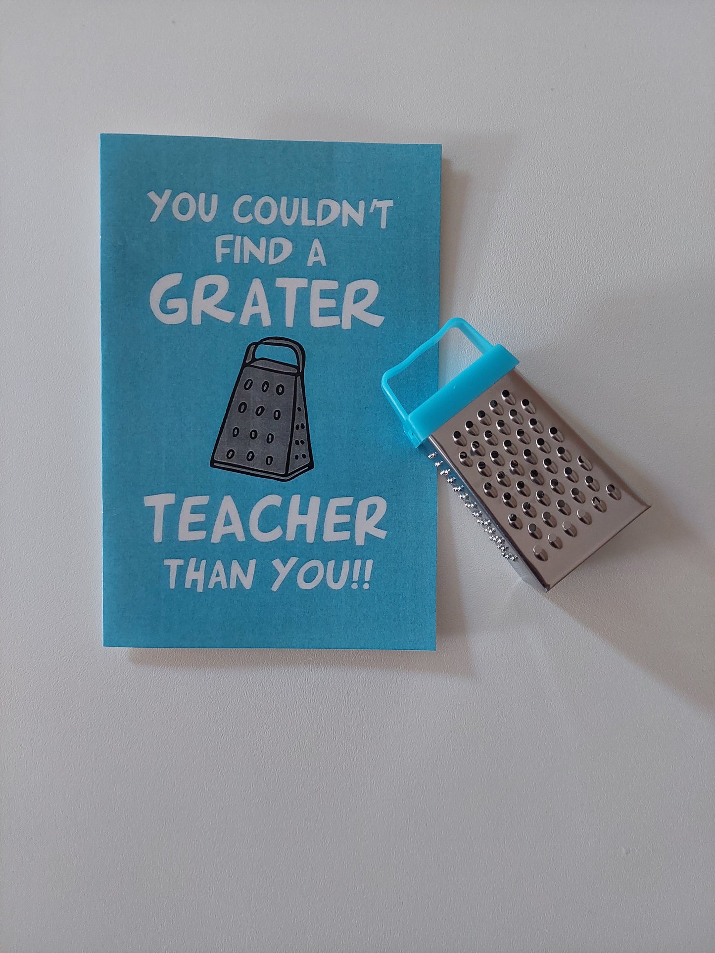 Kaartje en rasp 'grater teacher'